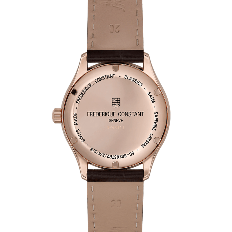 Rose gold-toned wristwatch with a brown leather strap and Frederique Constant branding on the case back.