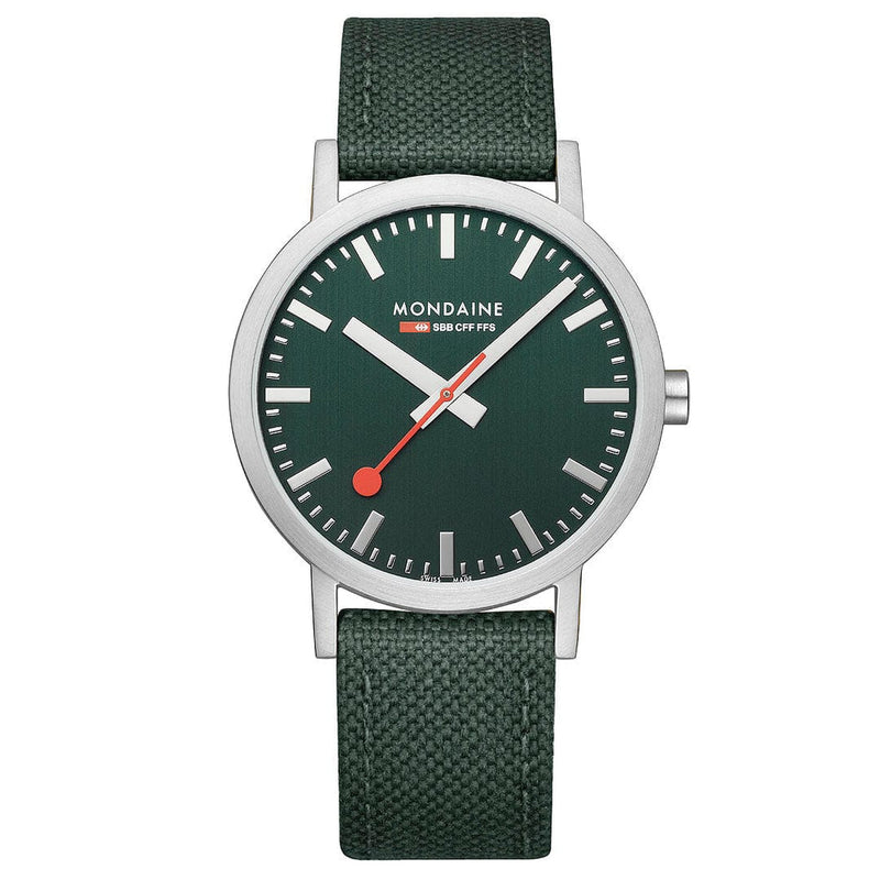 Green wristwatch with a silver case and fabric strap.