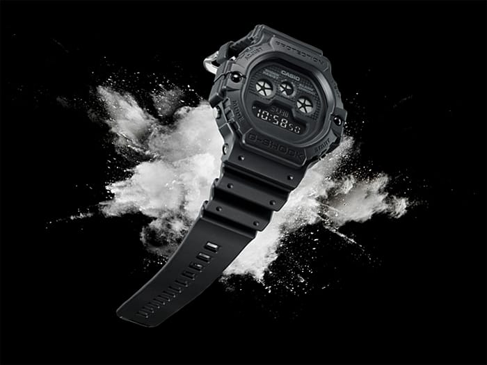 Digital sports watch with a rugged black design and multiple display screens.