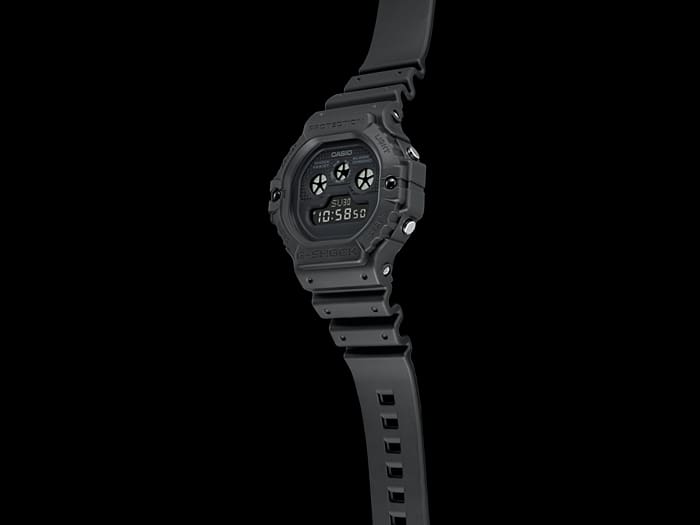 Digital sports watch with a rugged black design and multiple display features.