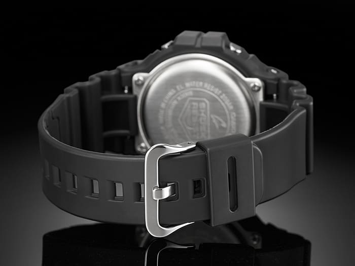 Digital wristwatch with a black rubber strap and metallic back case.