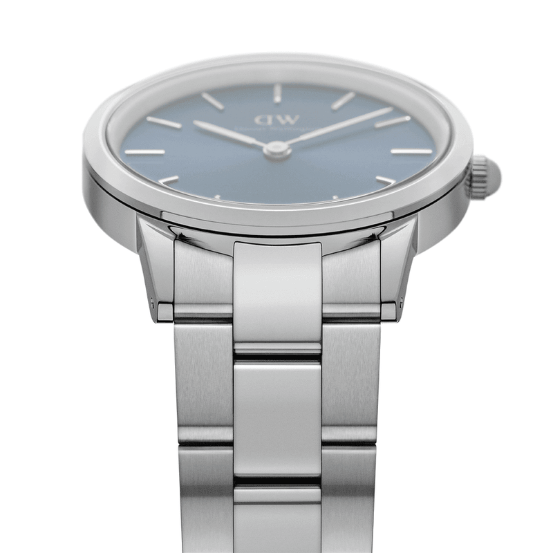 Stainless steel wristwatch with a blue dial and minimalist design.