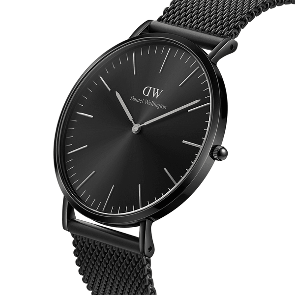 Sleek black wristwatch with a minimalist dial and mesh metal band.