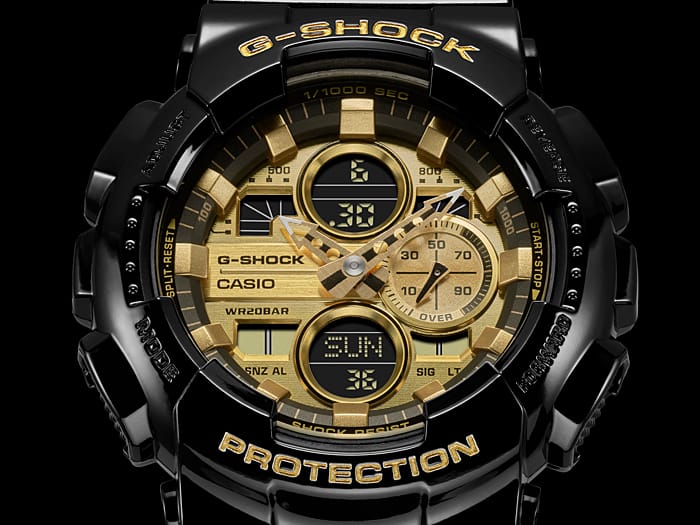 G-Shock watch with a black case and gold-colored dial featuring multiple digital and analog displays.