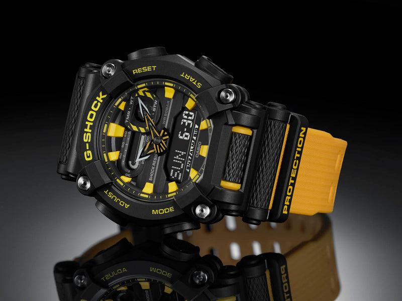 Rugged black and yellow G-Shock wristwatch with digital and analog displays.