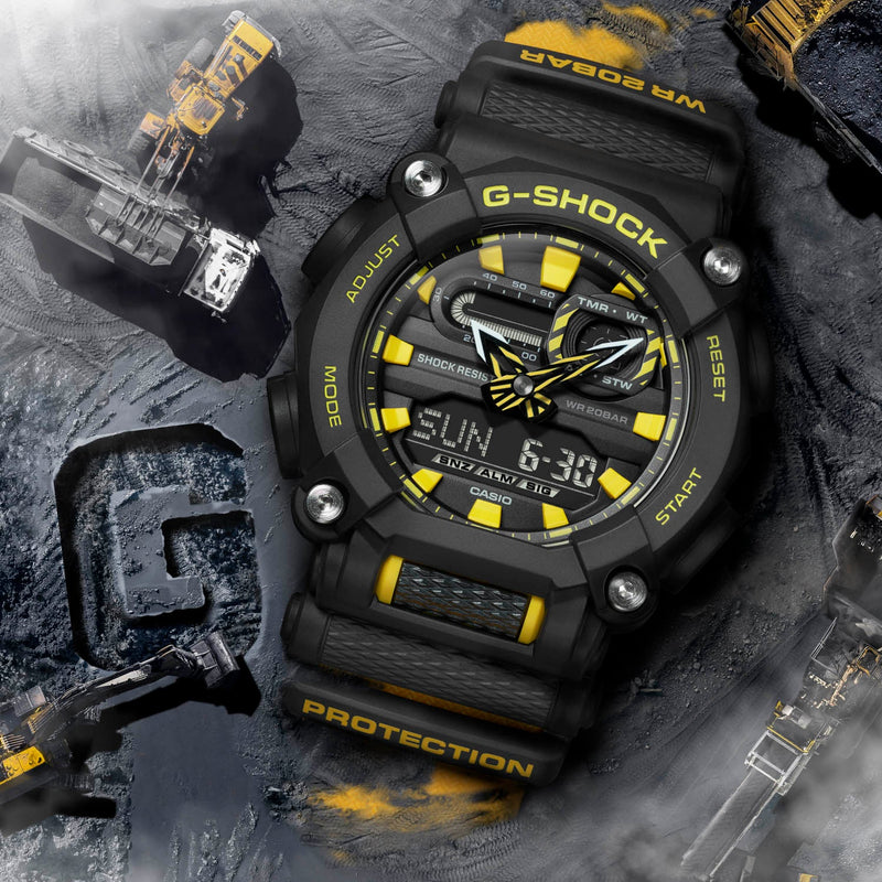 G-Shock watch with a black and yellow color scheme featuring a digital-analog display.