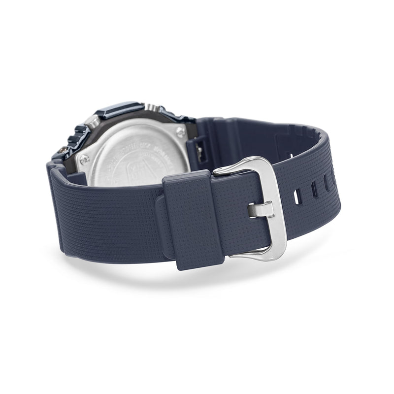 Navy blue rubber or silicone watch strap with a silver buckle.