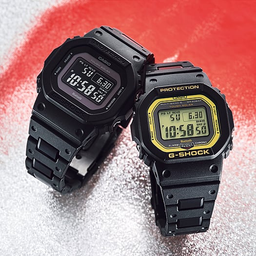 Two G-Shock digital watches with black bands and square faces.