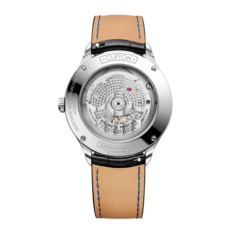 Luxury wristwatch with a tan leather strap and visible mechanical movement through the transparent caseback.