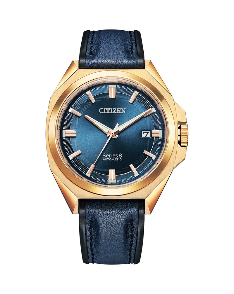 Gold-toned Citizen wristwatch with a blue dial and leather strap.