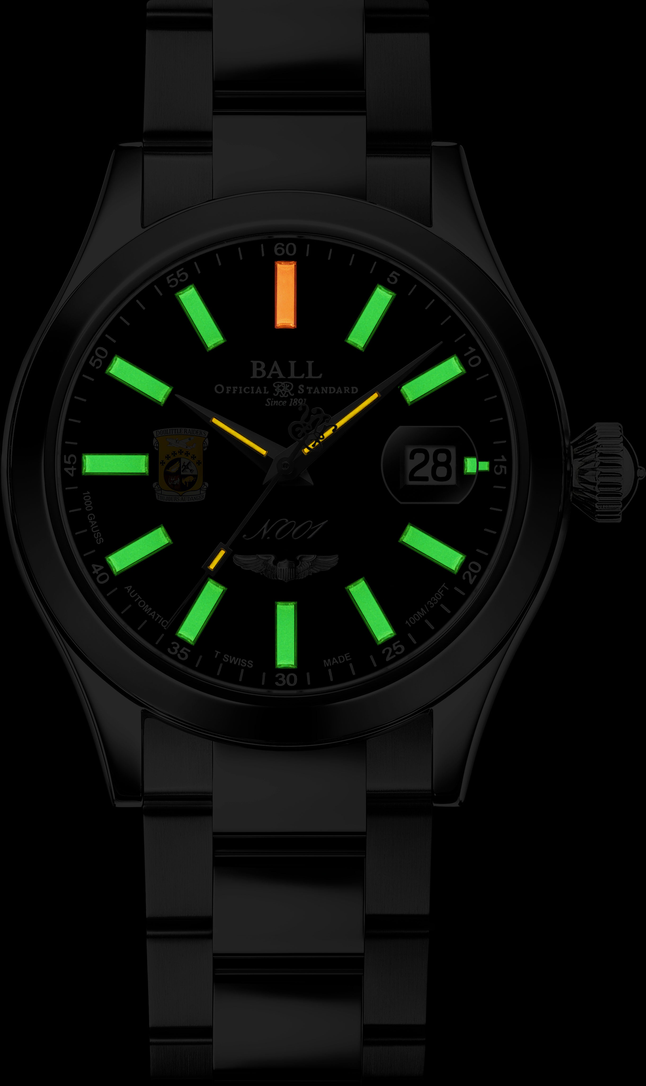 Wristwatch with glowing green hour markers and an orange minute hand.
