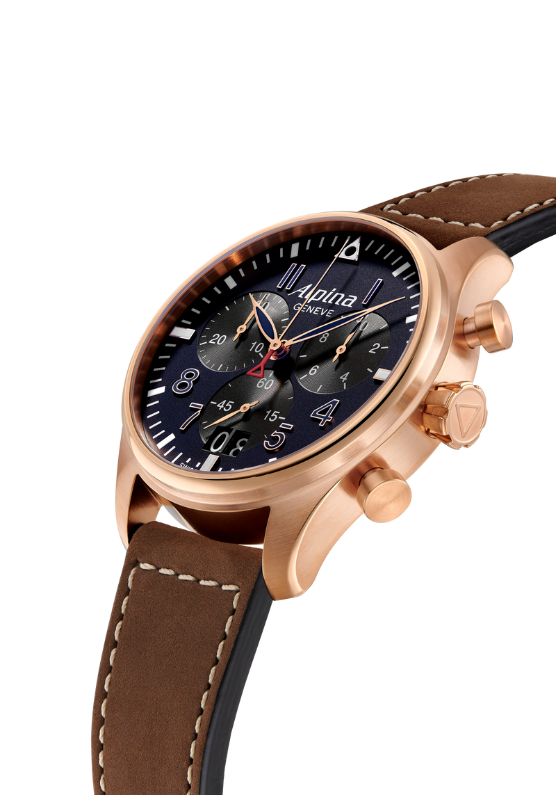 Luxury wristwatch with a brown leather strap and rose gold-toned case featuring a dark blue dial with multiple subdials.