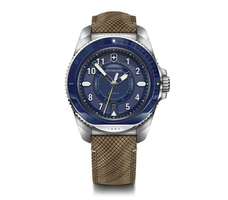 Wristwatch with a blue dial, silver case, and brown leather strap.