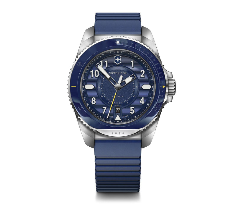 Blue and silver wristwatch with a round face and rubber strap.