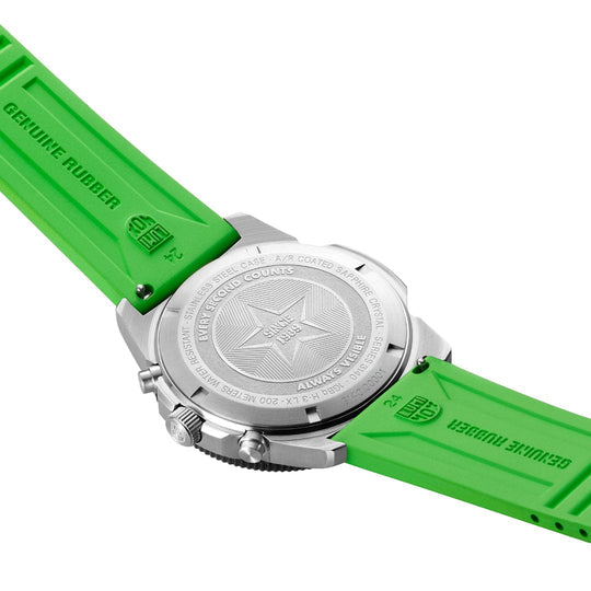 Wristwatch with a bright green rubber strap and silver metallic case.