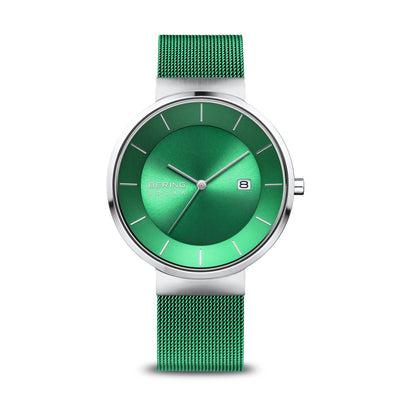 Sleek wristwatch with a green dial and matching green mesh band.