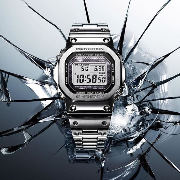 Rugged digital wristwatch with a metallic silver case and bracelet.