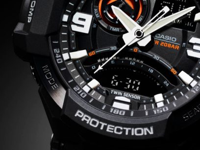 Rugged digital-analog wristwatch with multiple dials and ’Protection’ label.