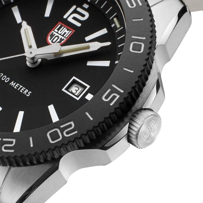 Wristwatch with a black dial and rotating bezel.